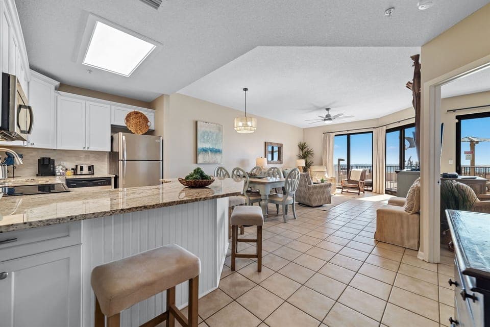 Enjoy the seamless flow from the living room to the spacious kitchen, perfect for preparing delicious meals.