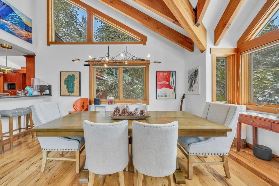 Dining Area: Seating for 6 at the dining table, 4 additional barstools at the kitchen peninsula