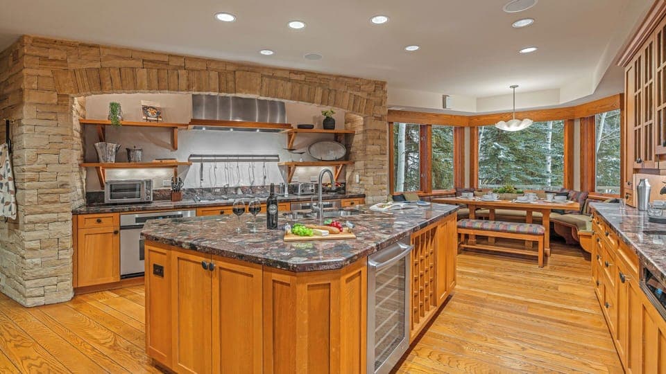Large gourmet kitchen with breakfast nook