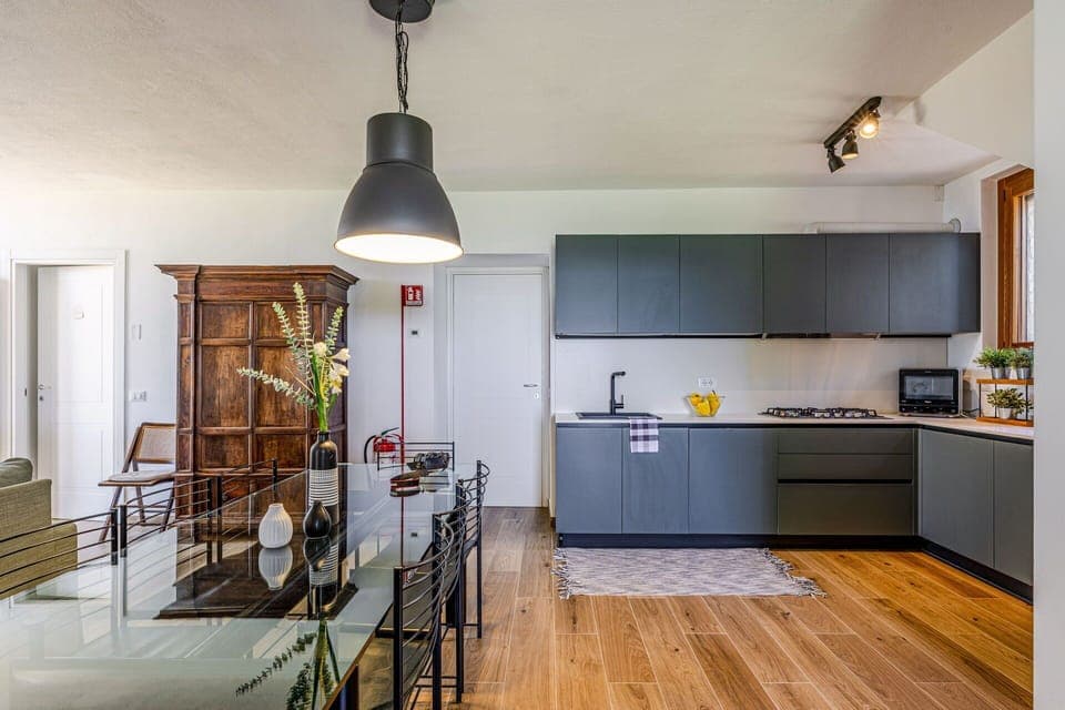 Furniture, Interior Design, Flooring, Floor, Wood, Ceiling, Wood Flooring, Kitchen, Cabinetry, Light Fixture