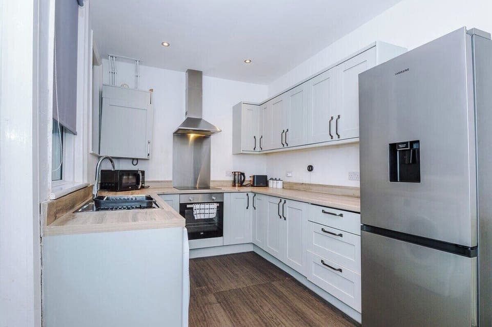 Includes oven, kettle, toaster, and all essential cookware.