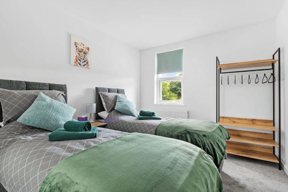 Bedroom 1 showing 2 singles that can be made as a king size bed. 