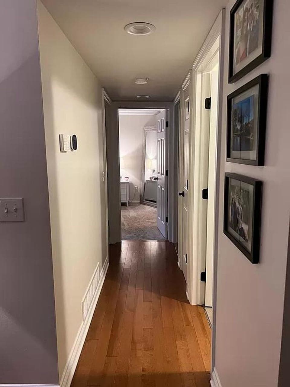 Hallway to bedrooms, bathroom, and laundry room.
