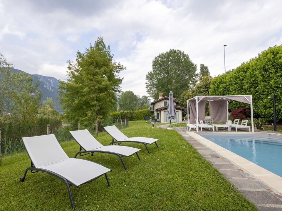 Outdoor Furniture, Swimming Pool, Furniture, Sunlounger, Garden, Resort, Shade, Chair, Leisure, Landscaping