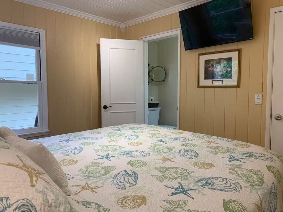 California King bedroom #2 with attached half bathroom. 