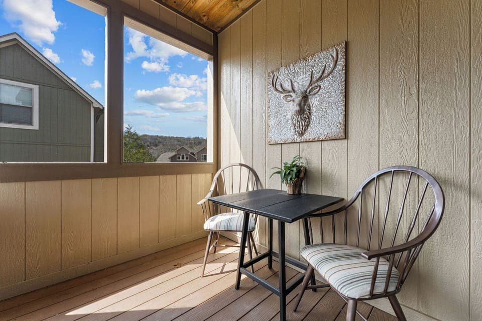 Unwind on our cozy screened porch off the main level—ideal for coffee with a book, dining, workspace, wine and conversation, or simply relaxing with nature. 