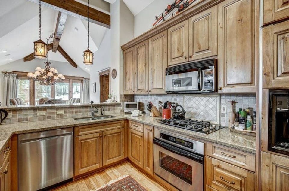 Cook like a chef in our gourmet kitchen, complete with high-end appliances, granite countertops, and ample storage space. Ideal for preparing delicious meals.