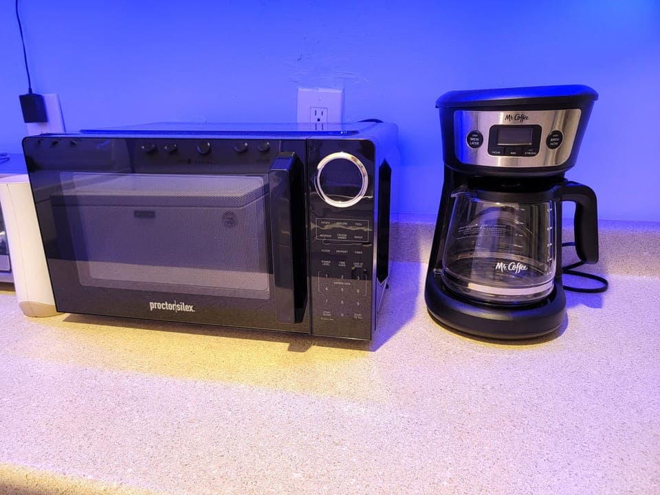 Kitchenette area with Full size fridge and washer and dryer