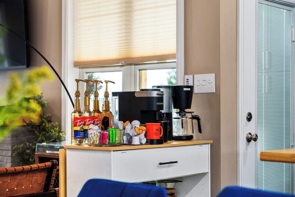 We want to make your mornings great by providing many coffee options to get you going. This coffee bar has it all!! K-cup machine, fancy drip pot and all the accessories you might need!