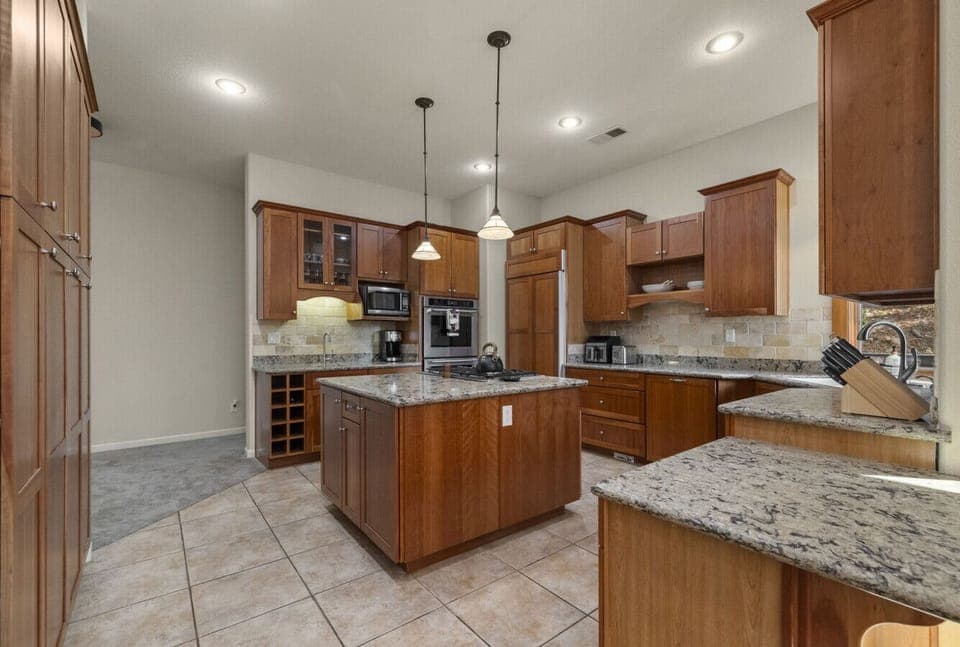 Fully stocked gourmet kitchen