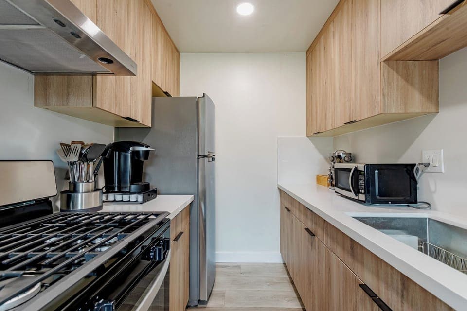 Kitchen with all the appliances. 