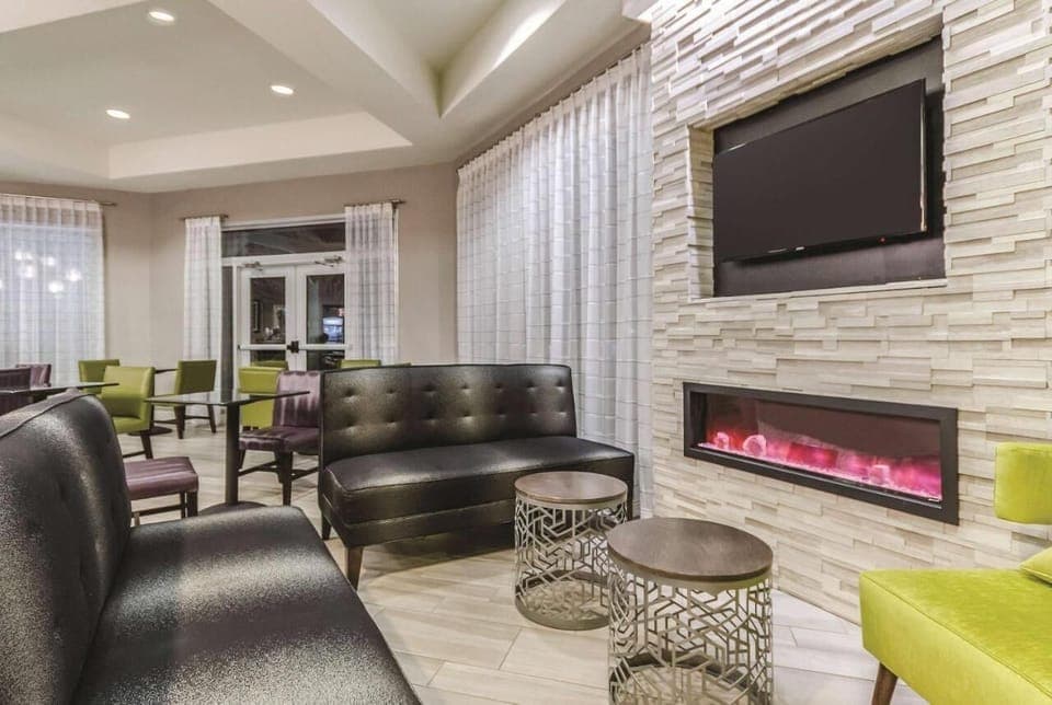 Unwind by the glowing fireplace in a stylish, social lounge.