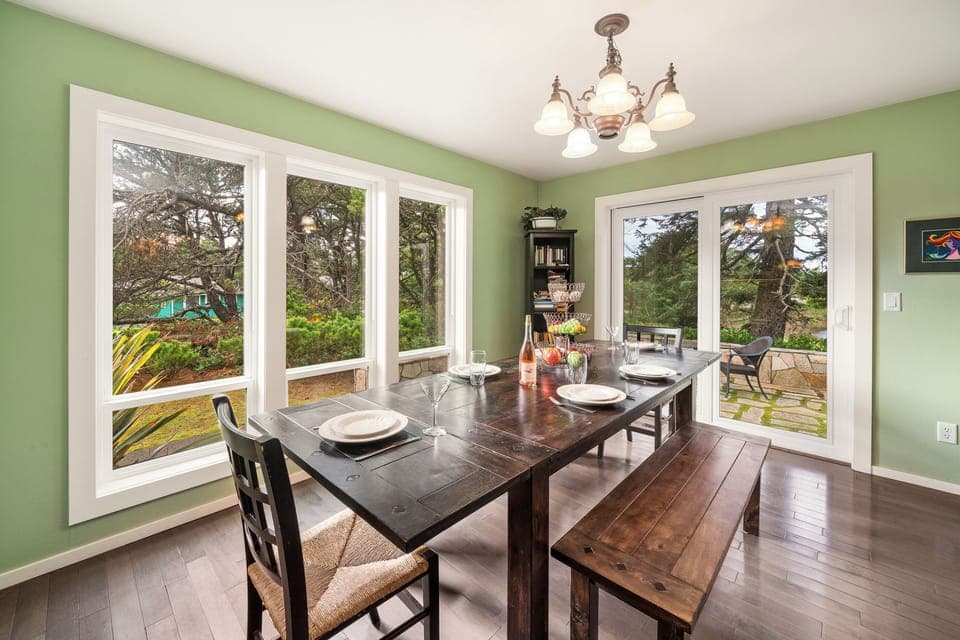 Dining room open to the fully equipped kitchen