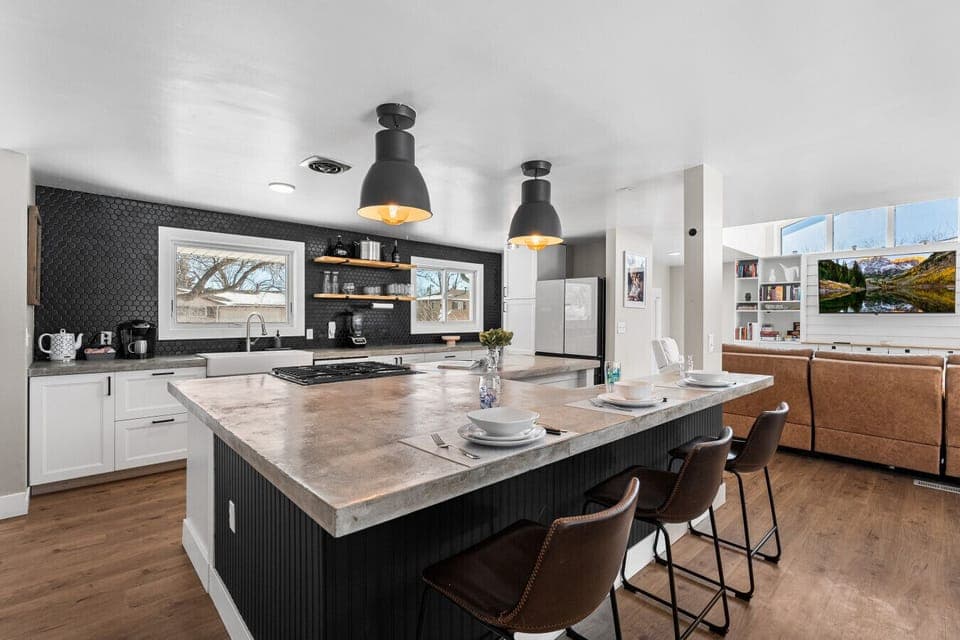 The kitchen island is huge and even comes with additional seating!