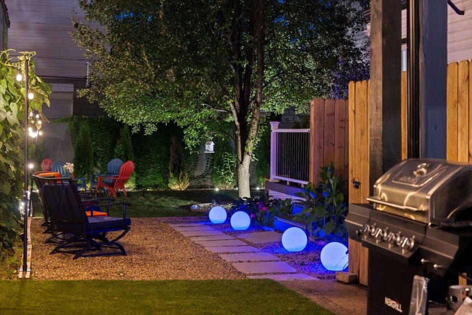 City Retreat, Private Escape – A rare fenced-in yard with ambient lighting and space to truly unwind.