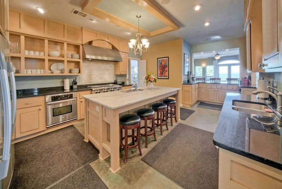 Fully Equipped Kitchen with Large Island and Bar Seating