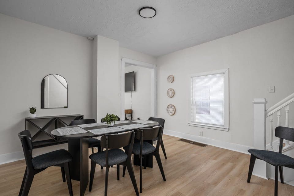 Dining Room: Enjoy stylish meals in a bright space with chic decor and an inviting ambiance!