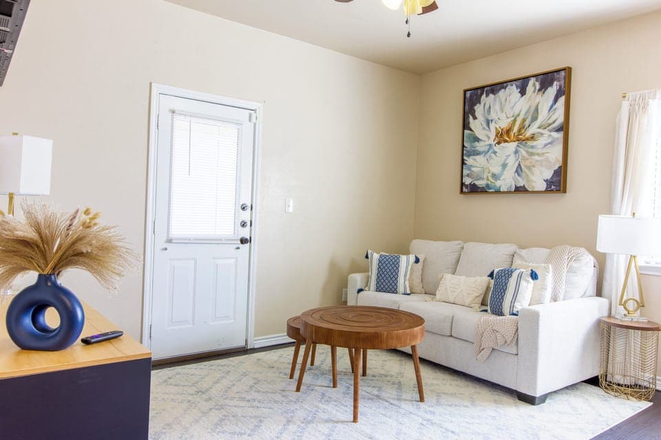 The chic and cozy living room provides a great place to hang out or relax.