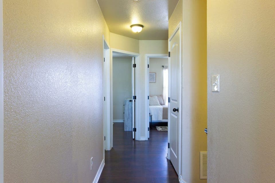 Hallways extends from master bedroom to the other two bedrooms. 
