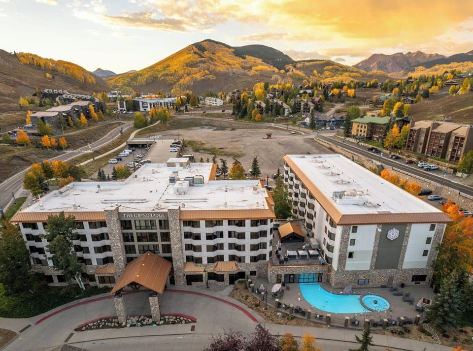 【Aerial + Fall Colors】The Grand Lodge pool deck and Mt. CB in late-September aspens