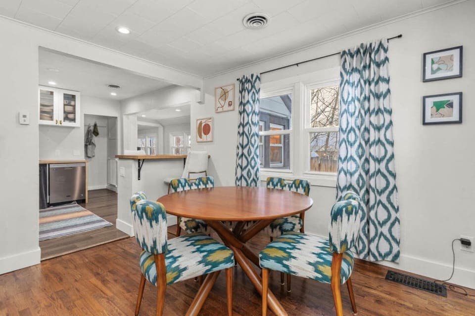 Dining Table with Kitchen in Background