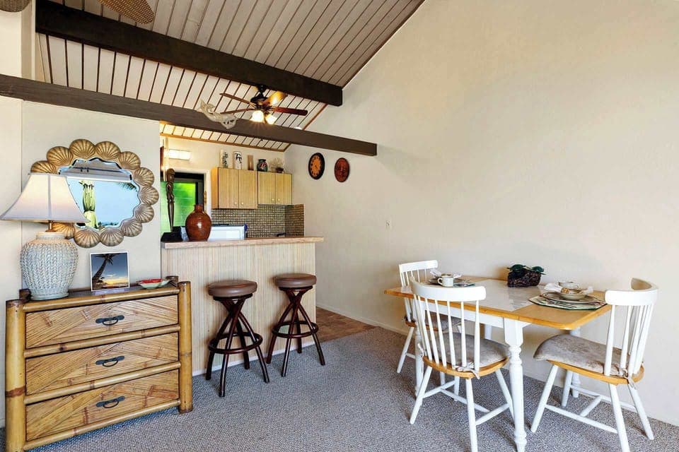 Dining table with seating for 3 and Kitchen bar counter with seating for 2