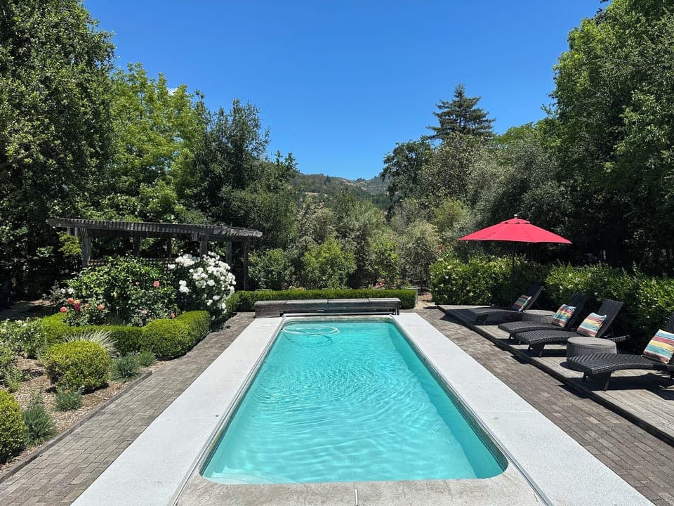 View of pool and Mayacamas Mountains from the back deck. 