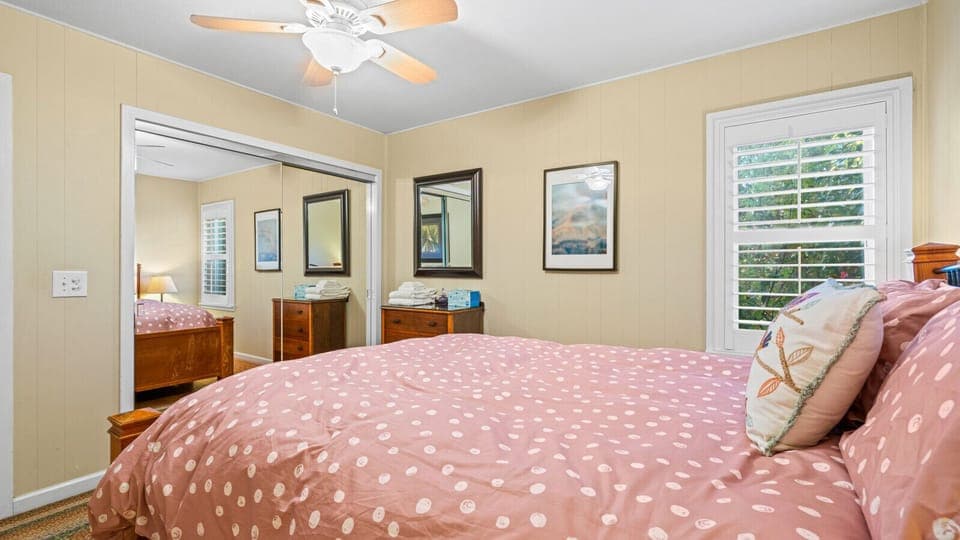 Cozy bedroom providing the most comfort with a queen bed, vast closet space and windows.