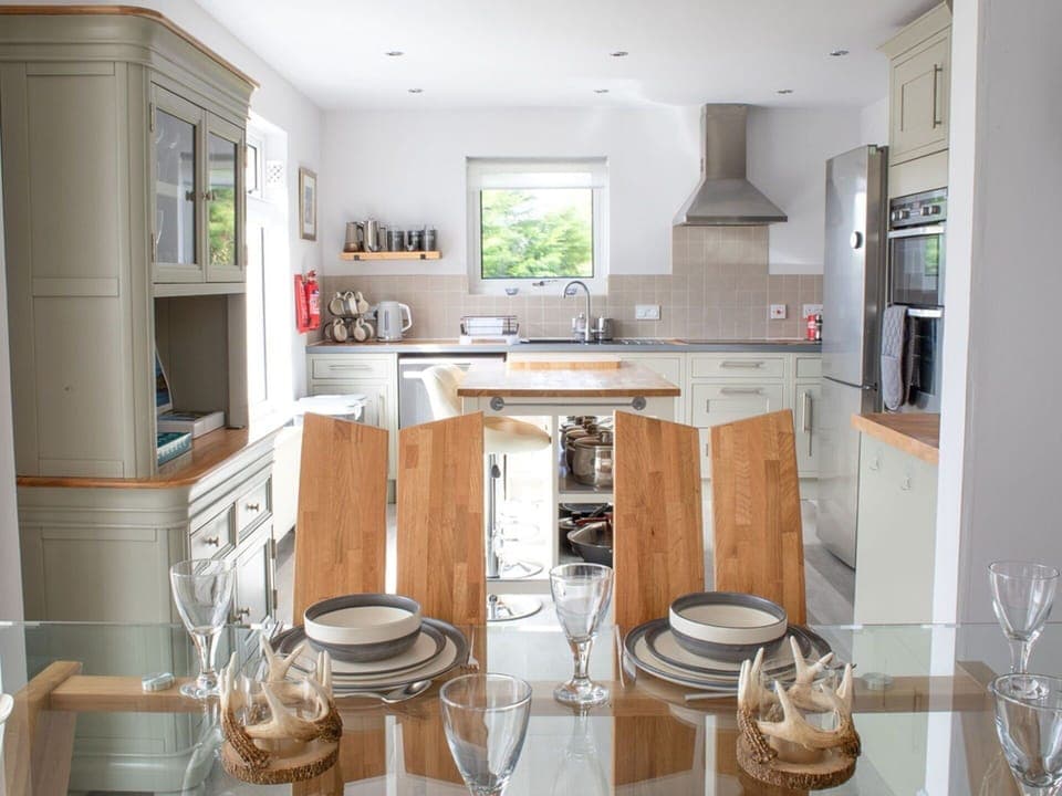 Furniture, Kitchen, Cabinetry, Countertop, Interior Design, Flooring, Kitchen Appliance, Wood, Major Appliance, Floor