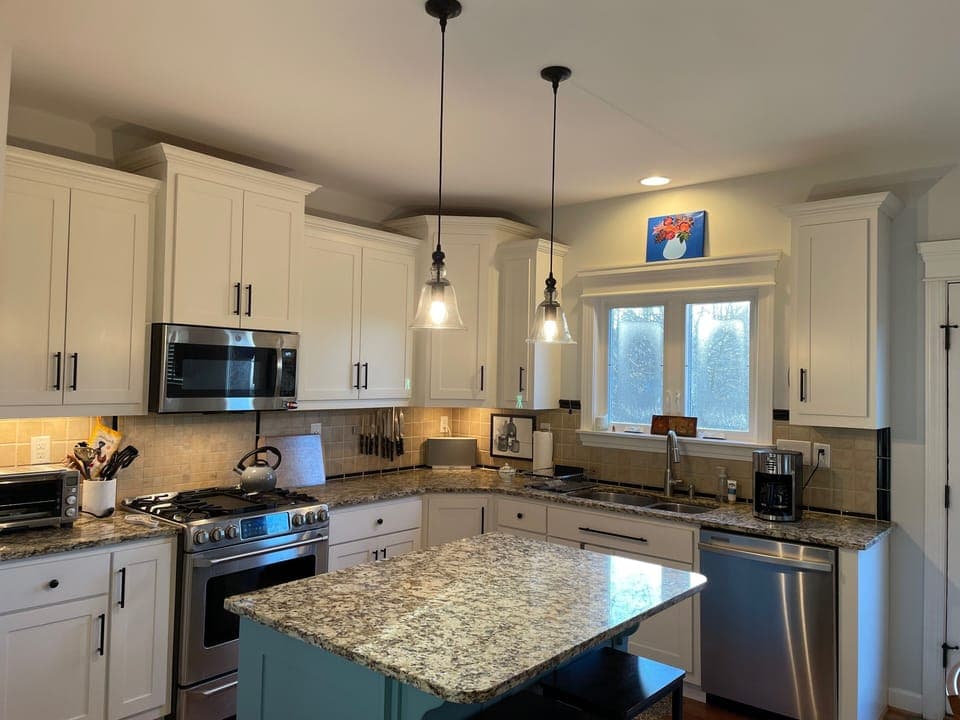 Kitchen with island and barstools