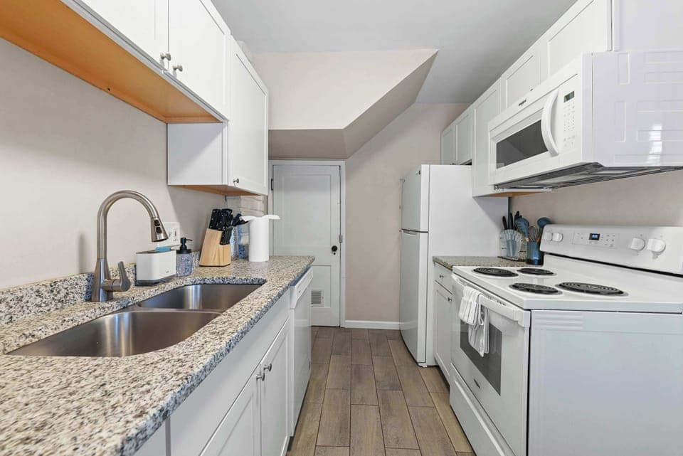 Enjoy every home comfort & abundant space in the sleek kitchen