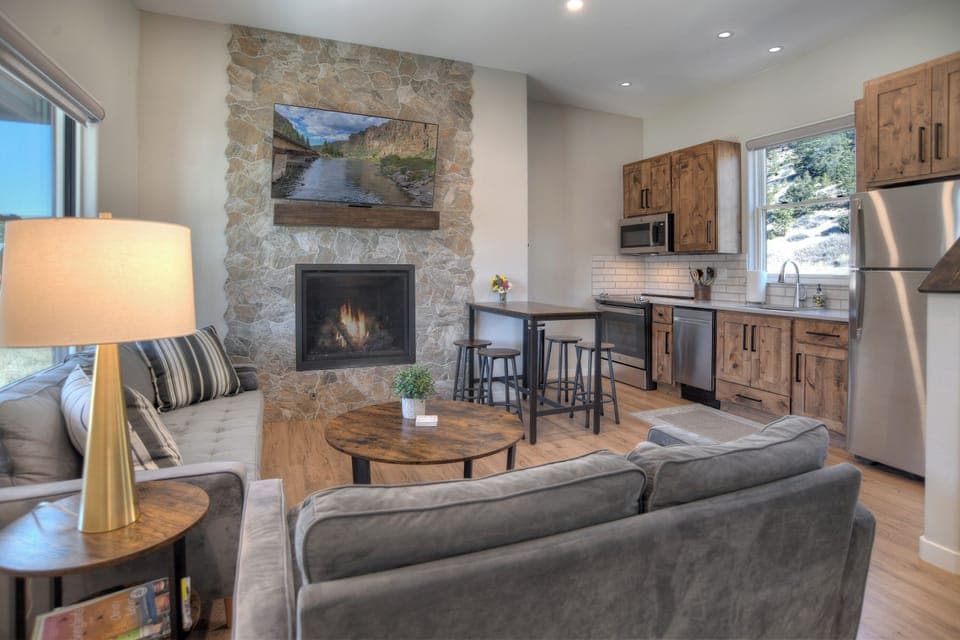 Living room and kitchen - Our home has a open living room and kitchen.  With a gas fireplace and dining area.
