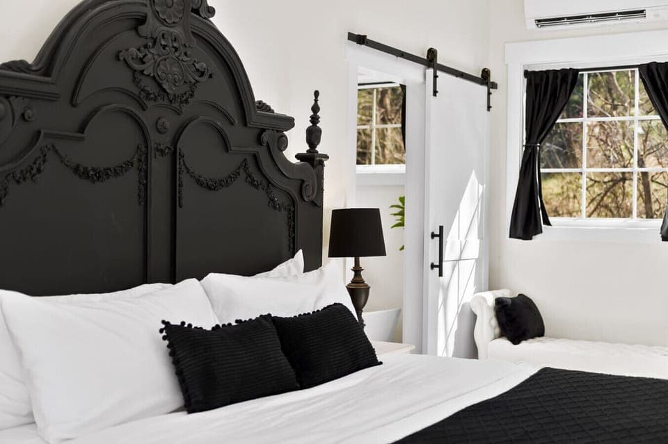 Relax in the luxurious French Antique King Bed