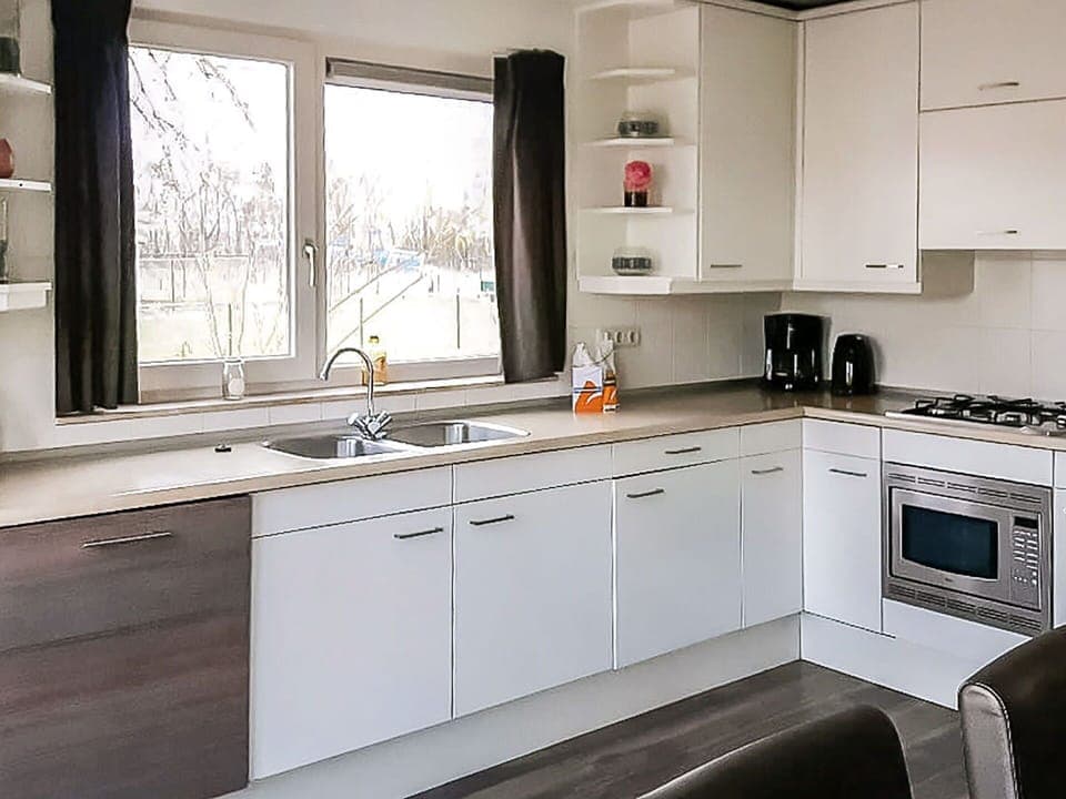 Countertop, Kitchen, Cabinetry, Kitchen Appliance, Kitchen Sink, Sink, Wood, Plumbing Fixture, Interior Design, Flooring