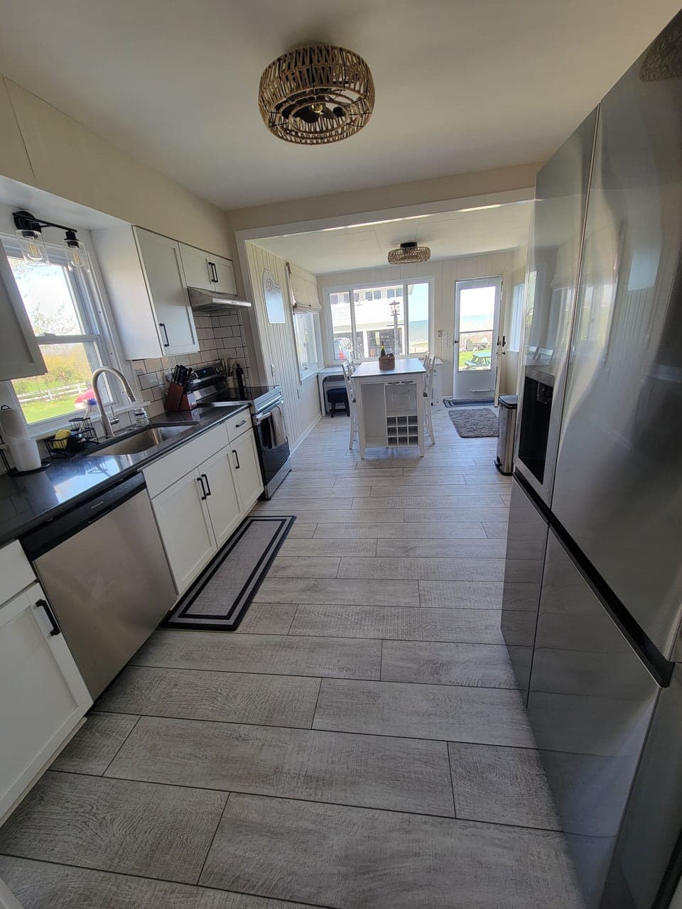 This Lake Erie view kitchen has new appliances and seating for 7.