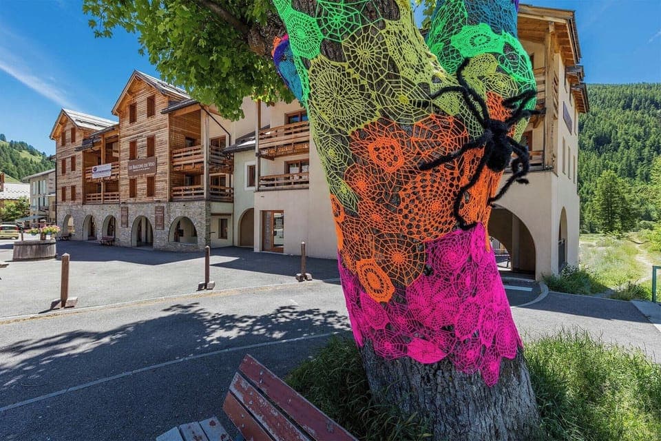 A vibrant and artistic touch in the heart of the village, adding a unique and colorful atmosphere to the surroundings.