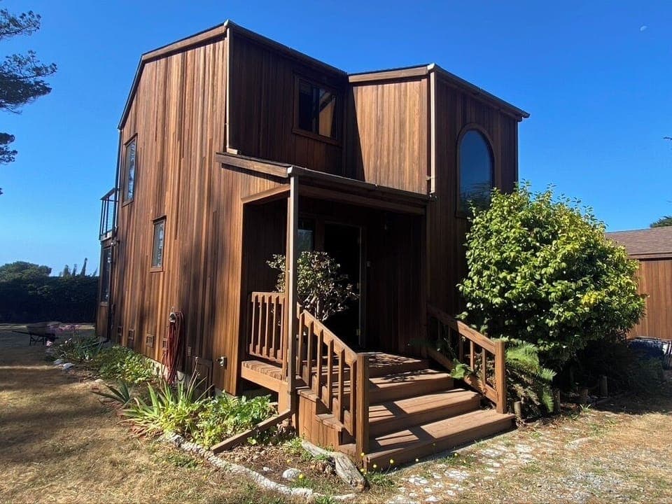 Front door, use code on knob to open or lock the door.