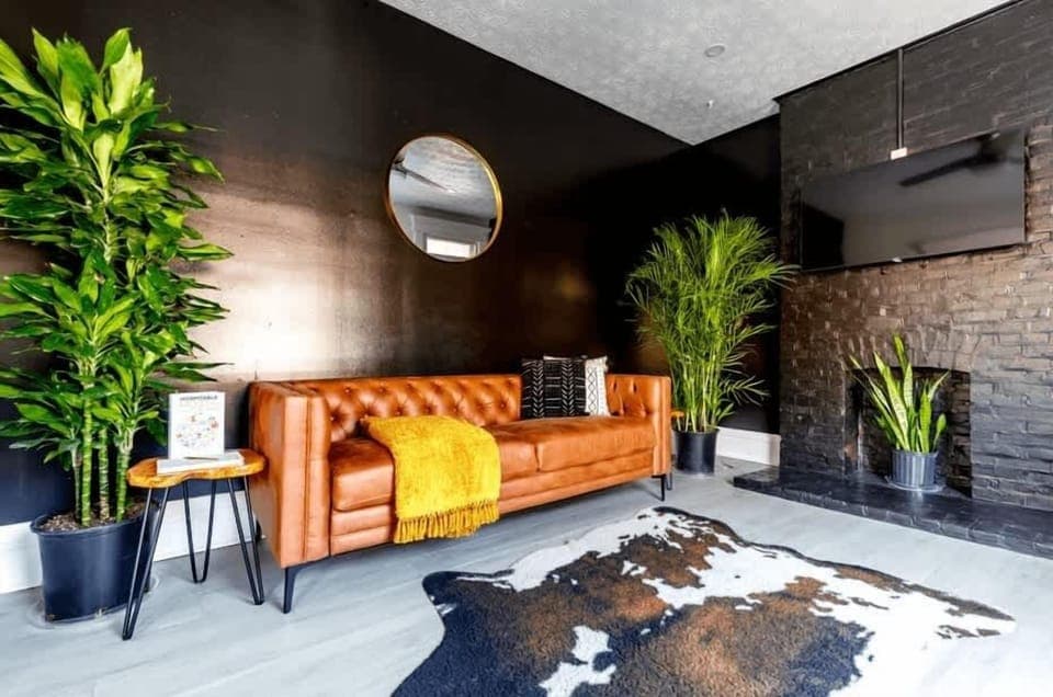 Relax in our beautifully designed living room featuring cozy seating and smart tech for your entertainment—ideal for a memorable Airbnb stay! Enjoy the comfort 