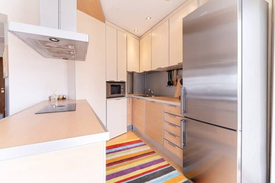 Fully equipped kitchen with all necessary utensils.