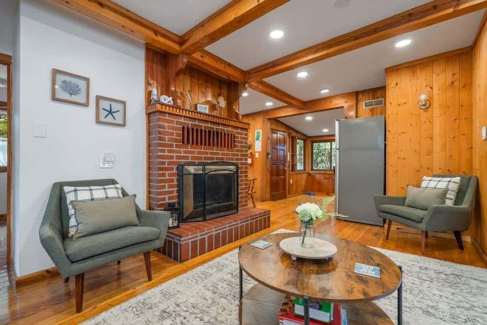 4. Stylish living room featuring a statement fireplace and elegant decor.