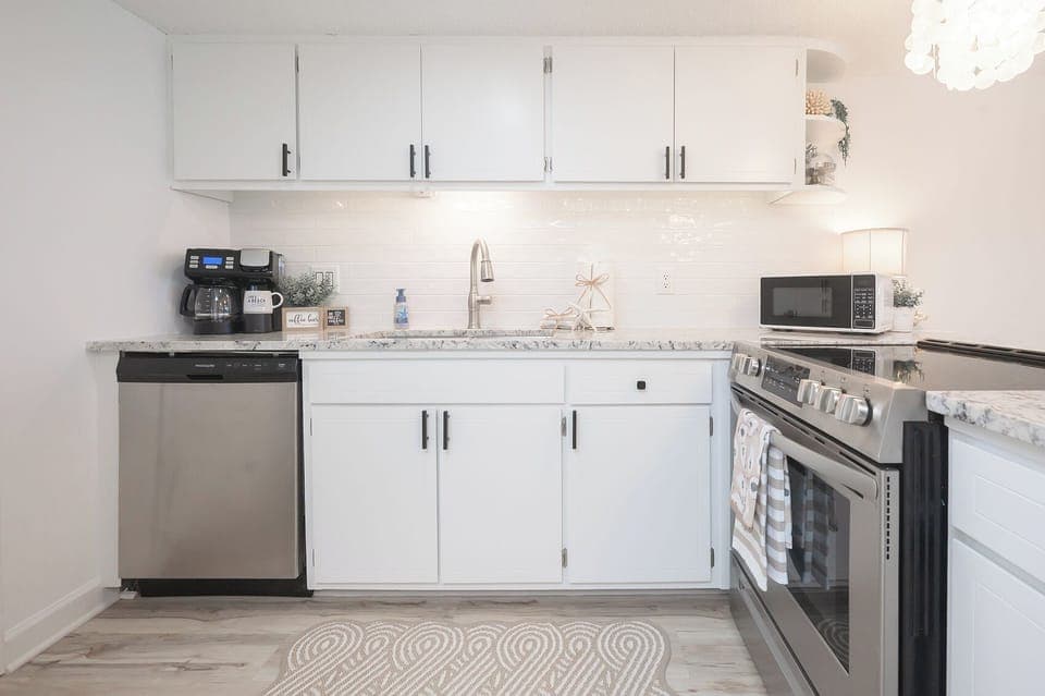 Bright and spacious kitchen with plenty of natural light—perfect for cooking, gathering, and enjoying the coastal vibes
