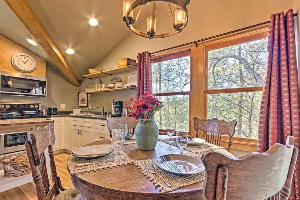 Fully equipped kitchen with full sized refrigerator.