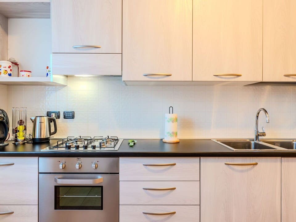 Kitchen, Kitchen Appliance, Countertop, Major Appliance, Cabinetry, Kitchen Stove, Home Appliance, Interior Design, Stove, Home