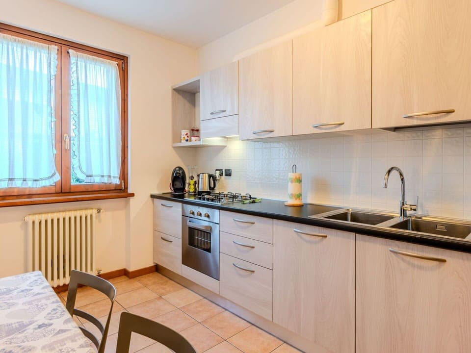 Kitchen, Interior Design, Kitchen Appliance, Wood, Flooring, Major Appliance, Countertop, Room, Cabinetry, Floor