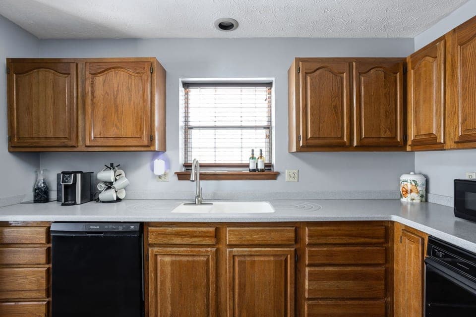 Our kitchen, with all of the cooking basics and supplies to start a family meal!