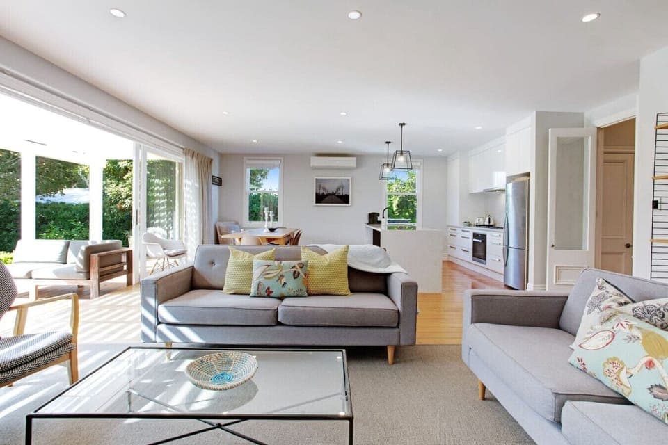 The open plan living space includes the kitchen, dining and living room area.