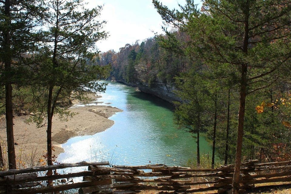 Scenic hiking nearby: the 6-mile War Eagle Valley Loop at Hobbs State Park.