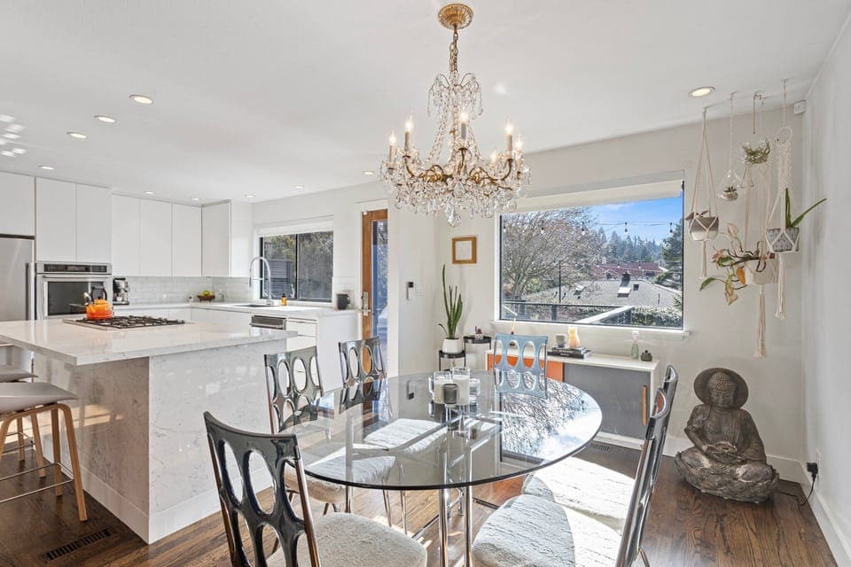 Seating for 6 with additional seating at the island and indoor water feature