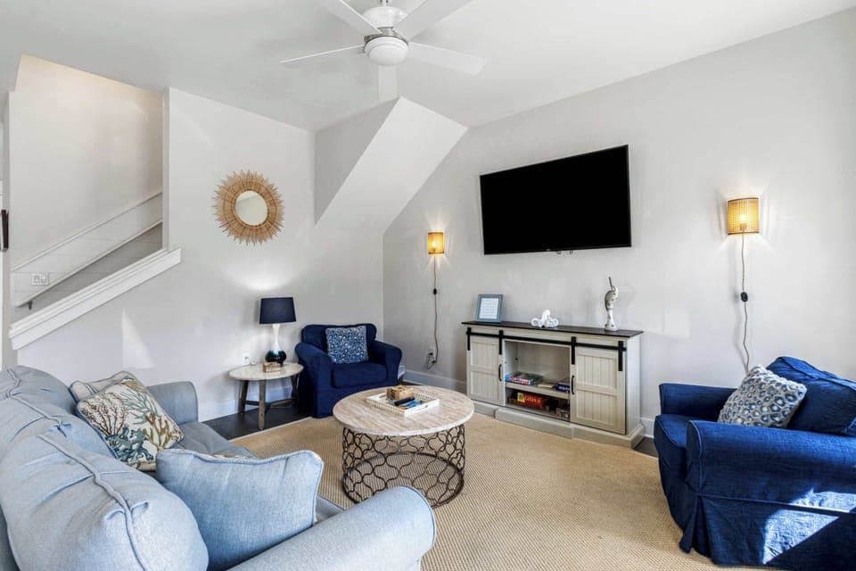 Living room: Main floor, smart TV, open layout, comfortable seating