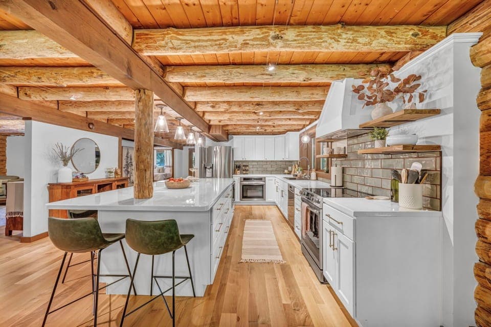 This bright, open kitchen with its long island flows easily for cooking, gathering, and sharing time together.